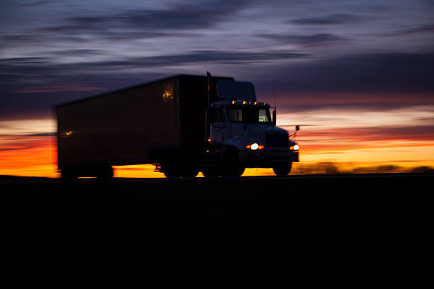 istock Tractor trailer on highway at sunset. 478388479