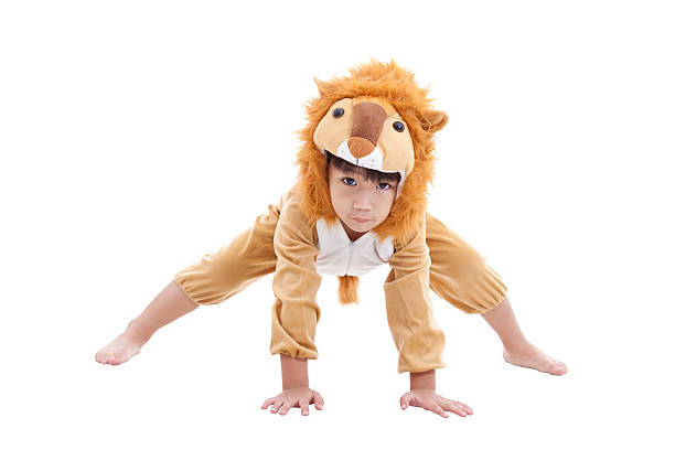 istock Cute little boy dressed in lion suit 478393540