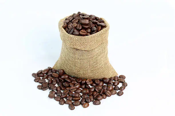 coffee beans with sack on white background
