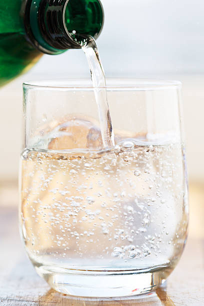 istock natural water pouring into glass 478396031