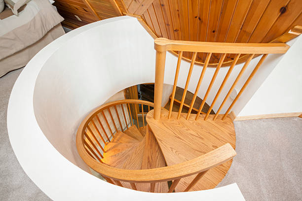 istock Looking Down Custom Hardwood Spiral Staircase 478398188