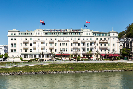 Vienna, Austria- April 21, 2015: Hotel Sacher at Salzach river in Salzburg, Austria. The hotel was built between 1863 to 1866 by the hotelier and master builder Carl Freiherr.