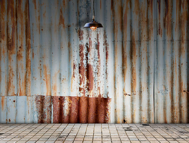 istock Lamp at Rusted galvanized iron plate with tile floor 478402288