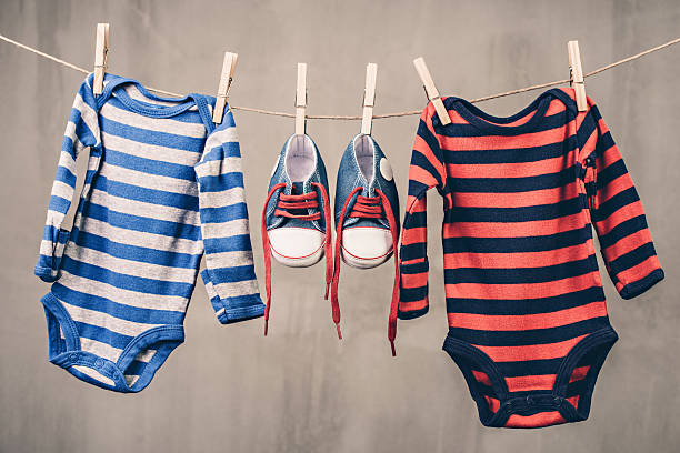 istock Baby laundry hanging on a clothesline 478402848