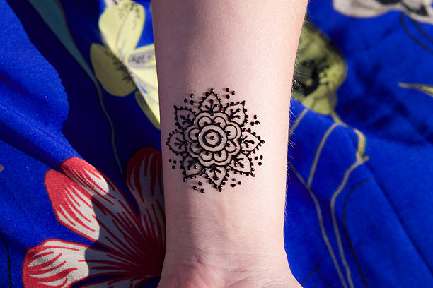 istock henna tattoo mehendy on hand mandala 478403892