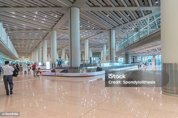 Take Baggages At The Bejing International Airport Stock Photo - Download Image Now - 2015, Airport, Airport Departure Area