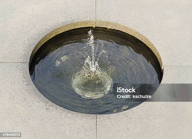 Circular Public Fountain Surrounded By Concrete Stock Photo - Download Image Now - Circle, Concrete, Continuity