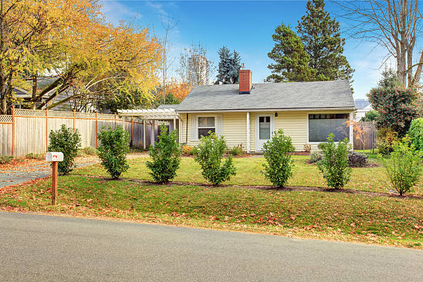 istock Traditional yellow house with yard. 478408406