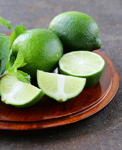 istock Fresh natural organic green lime with mint leaves 478408718