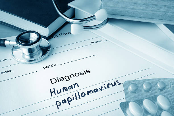 istock Diagnostic form with diagnosis Human papillomavirus HPV and pills. 478409498