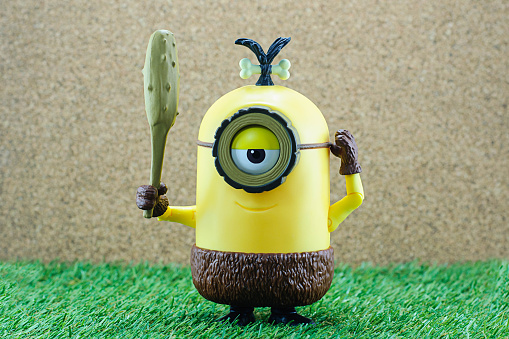 Bangkok,Thailand - June 21, 2015: Cro-Minion on green grass  fictional character from Minions animated 3D film produced by Illumination Entertainment for Universal Pictures.