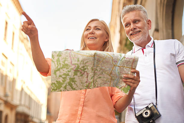 istock Attractive couple exploring the city 478412978