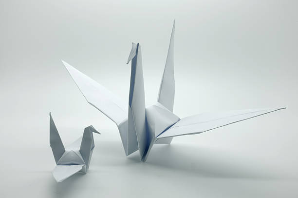 istock White origami crane, bird, paper 478413208