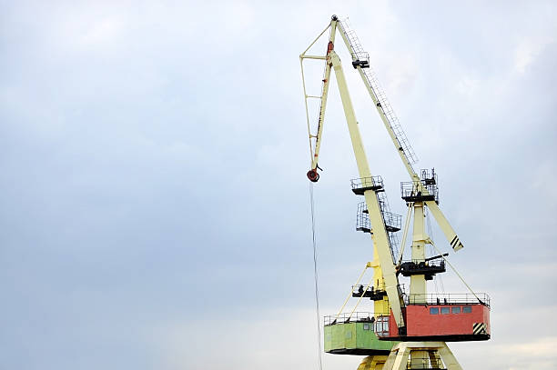 istock Industrial port cranes for containers 478413370
