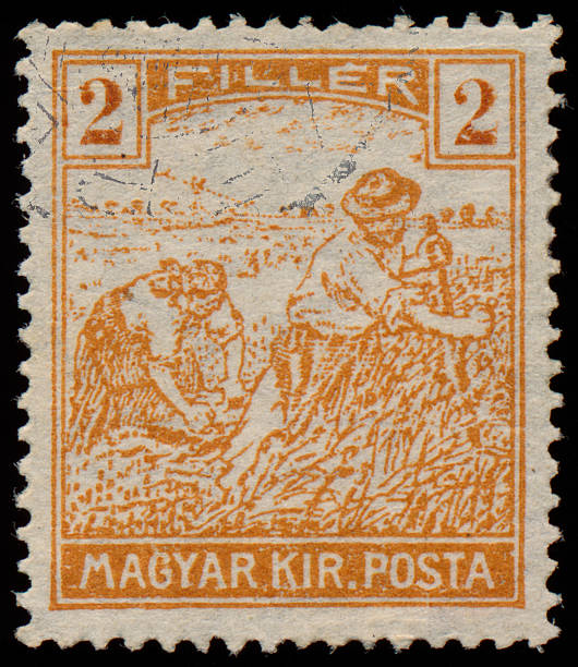istock Stamp printed in Hungary shows Harvesting Wheat 478413461