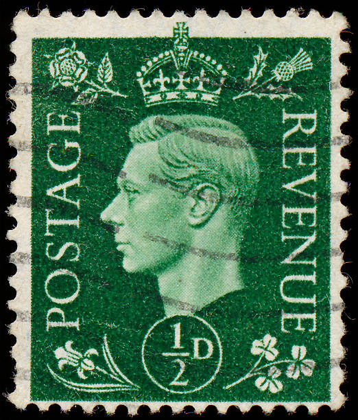 istock Stamp printed in UK shows image of the George VI 478413501