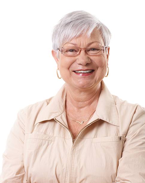 istock Closeup portrait of happy elderly lady 478414455