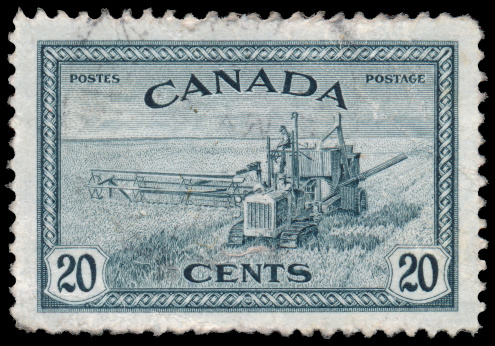 CANADA - CIRCA 1946: a stamp printed in the Canada shows Combine Harvester, circa 1946