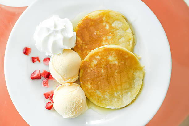 istock pancakes with ice cream and golden maple syrup 478417730