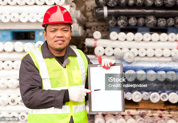 Textile Factory Worker Stock Photo - Download Image Now - 2015, Adult, Adults Only