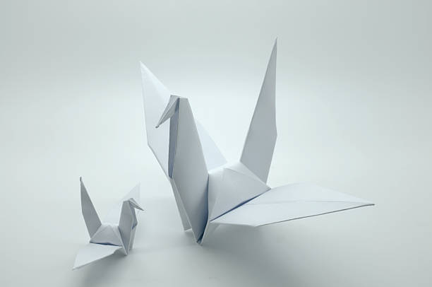 istock White origami crane, bird, paper 478419698