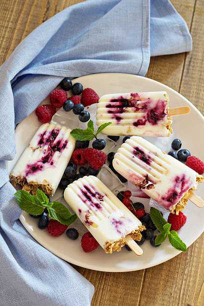 istock Frozen yogurt popsicles with oats and jam 478428448