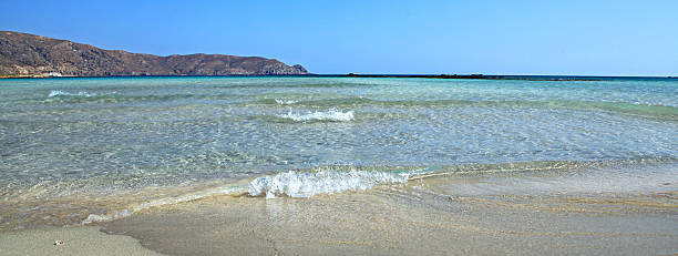 istock Shallow clear sea with pink sand beach at Elafonisi, Crete 478428719