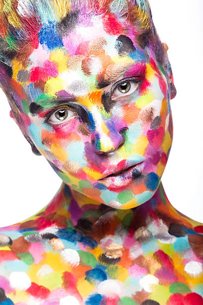 istock Girl with colored face painted. Art beauty image 478431646