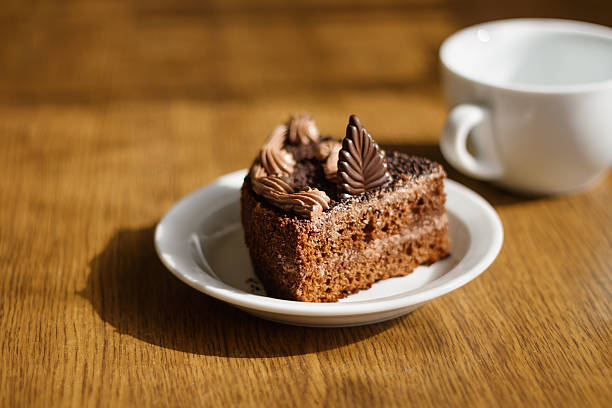istock Piece of cake on a plate and tea 478432956