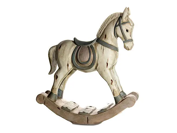 a white small rocking horse with white background