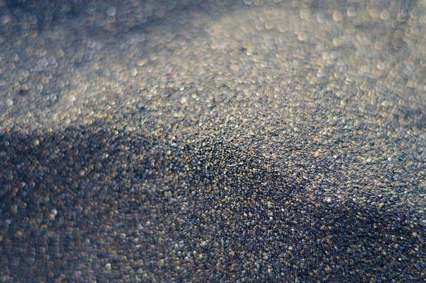 istock Abstract blurred volcanic black sand background 478437060