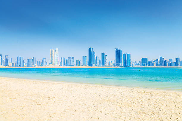 City view from Al Mamzar Beach Park in Dubai, UAE .Al Mamzar is located in the area of Deira, in the north-east of Dubai. The locality is bordered by the Persian Gulf to the north, Al Waheda to the west, Hor Al Anz to the south and the emirate of Sharjah to the east.
