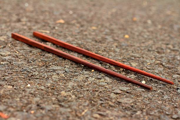 istock pair of chopsticks on a black background. 478437748