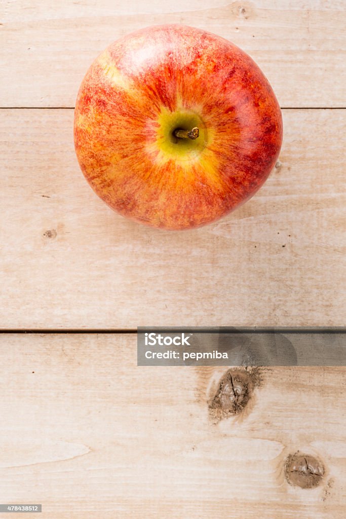 Single apple Red chief apple over light wooden table 2015 Stock Photo