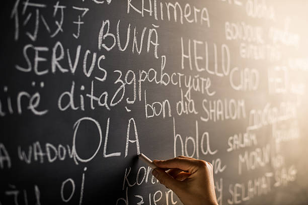 Hello in many languages Hello in many languages written with chalk on blackboard word cloud photos stock pictures, royalty-free photos & images