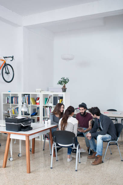istock Young creatives on an improvised meeting 478440521