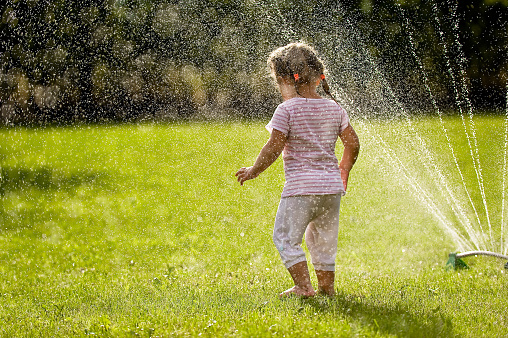 playing with water, playing, water, child, garden, calendar, horizontal