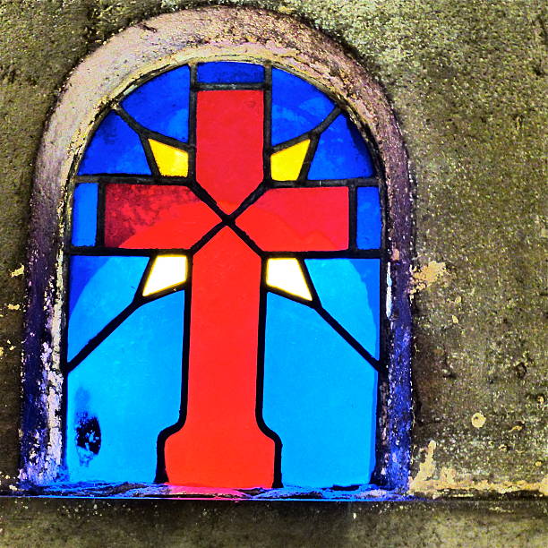 istock Paris stained glass cross cemetery 478443448