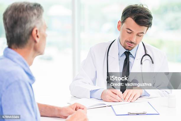 Doctor And Patient Stock Photo - Download Image Now - 2015, Adult, Asking