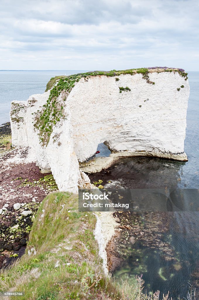 Old Harry Rocks, Dorset, United Kingdom The Old Harry Rocks are three chalk formations, including a stack and a stump, located on the Isle of Purbeck in Dorset 2015 Stock Photo