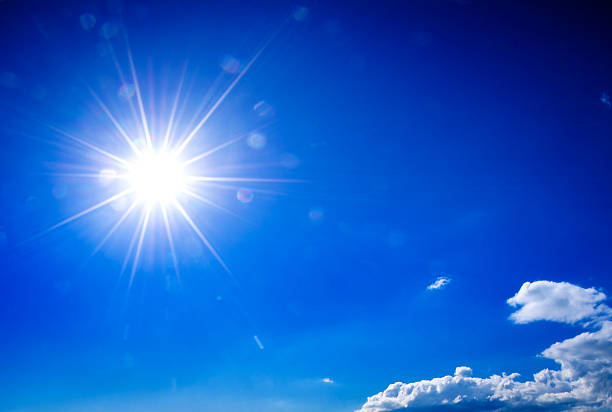 istock lensflare sunbeam on blue sky 478446503