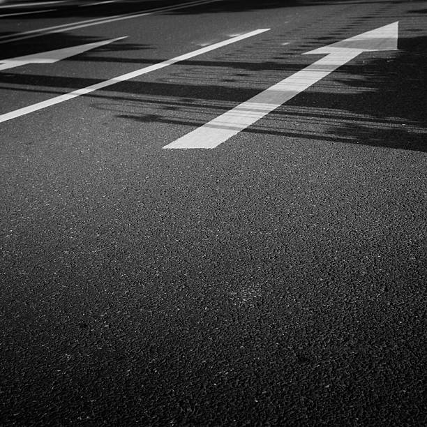 istock road with arrows sign 478447001