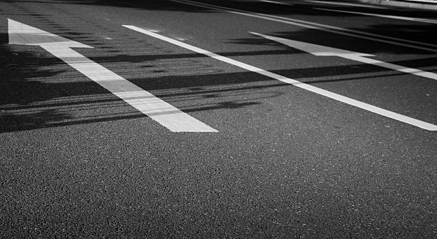 istock road with arrows sign 478447039
