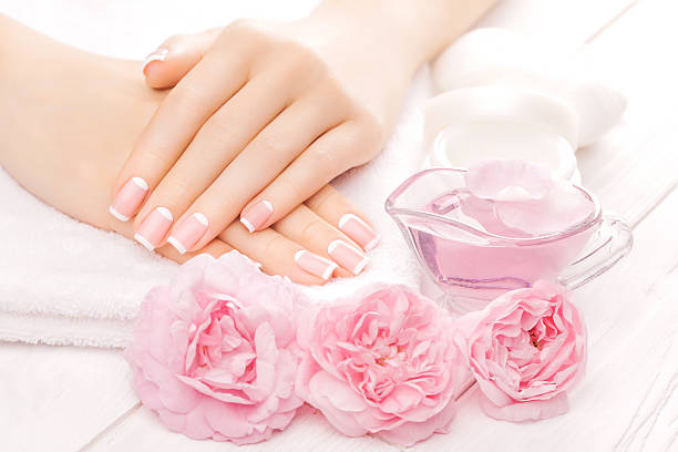 istock french manicure with rose flowers. spa 478447946