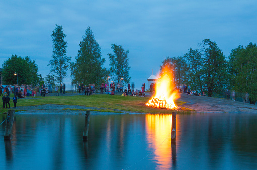 Savonlinna, Finland. June 19, 2015: Bonfire burning during summer solstice celebrations in Savonlinna, Finland.