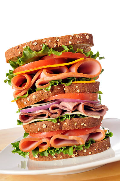 istock Triple Decker Dagwood Sandwich on Whole Wheat Bread 478452665