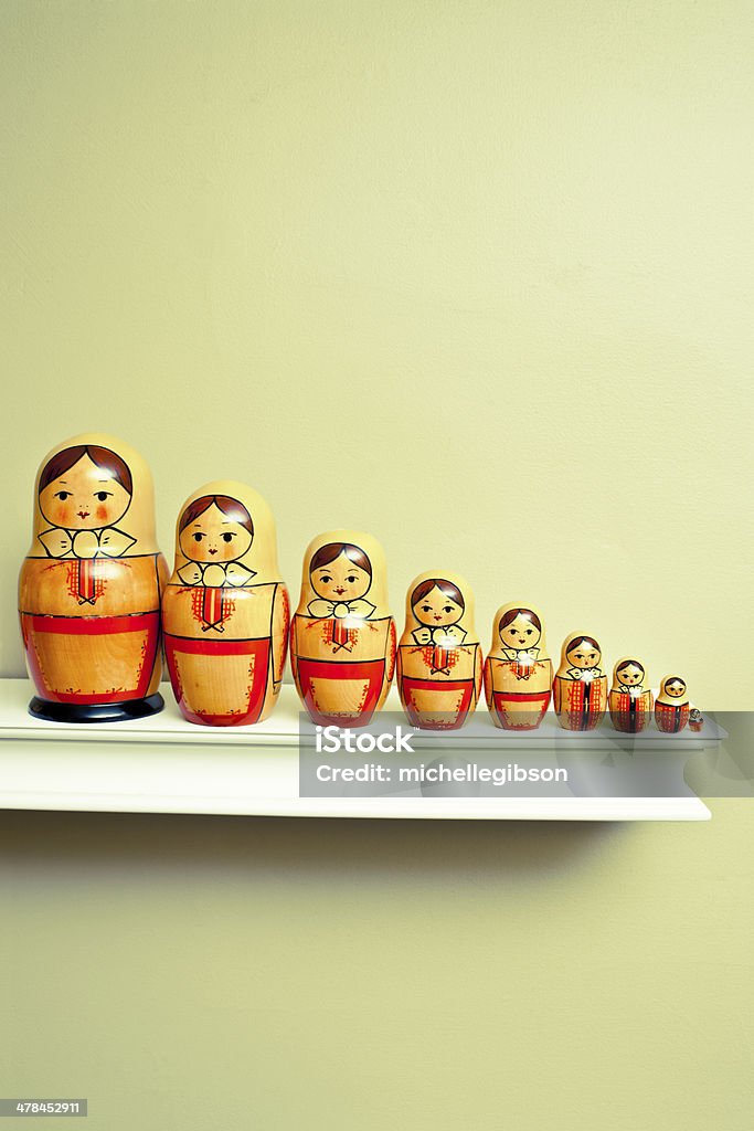 Russian nesting dolls Russian nesting dolls on a shelf in a row Russian Nesting Doll Stock Photo