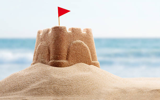 Holiday concept Holiday concept with sandcastle on the seaside sandcastle structure stock pictures, royalty-free photos & images
