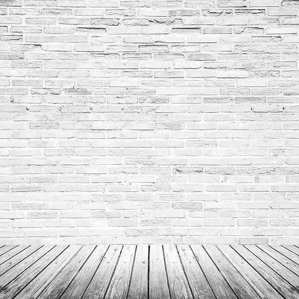 istock Old interior room with brick wall and wood floor 478454538