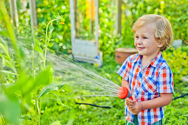 istock Child in the garden 478456471